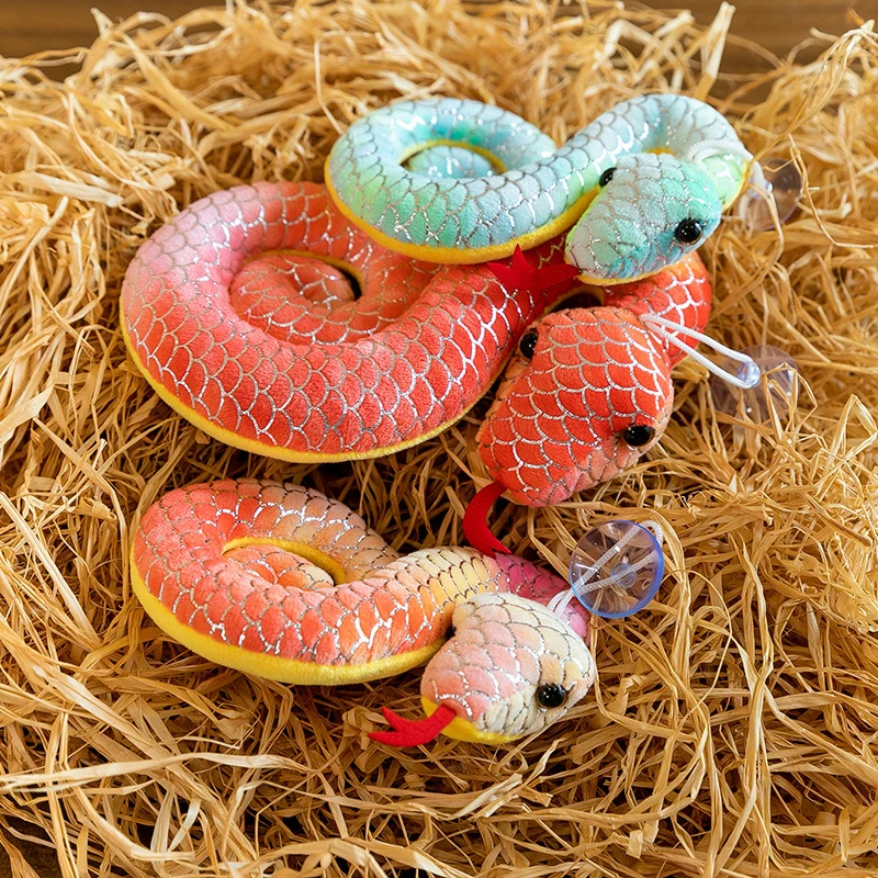 Отпразднуйте Год Змеи счастливой плюшевой игрушкой — тай-дай и золотые акценты