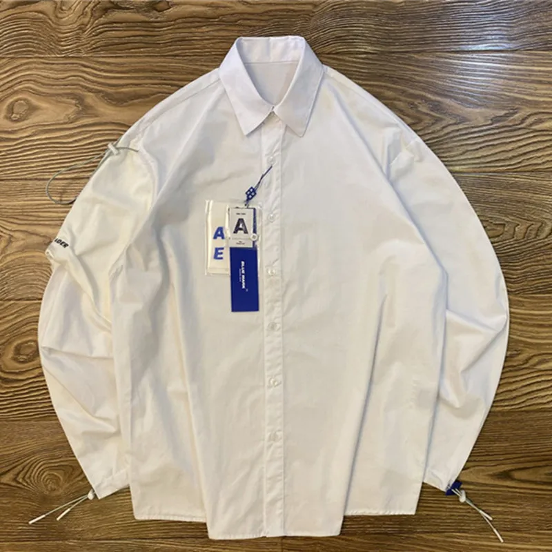 

Рубашки с длинным рукавом и шнурком, с длинным рукавом