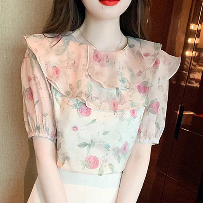 

Женская блузка с коротким рукавом, круглым вырезом и оборками