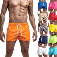 2022 summer new mens fashion beach mens shorts polyester quick drying solid color quarter pants mens sports pants
