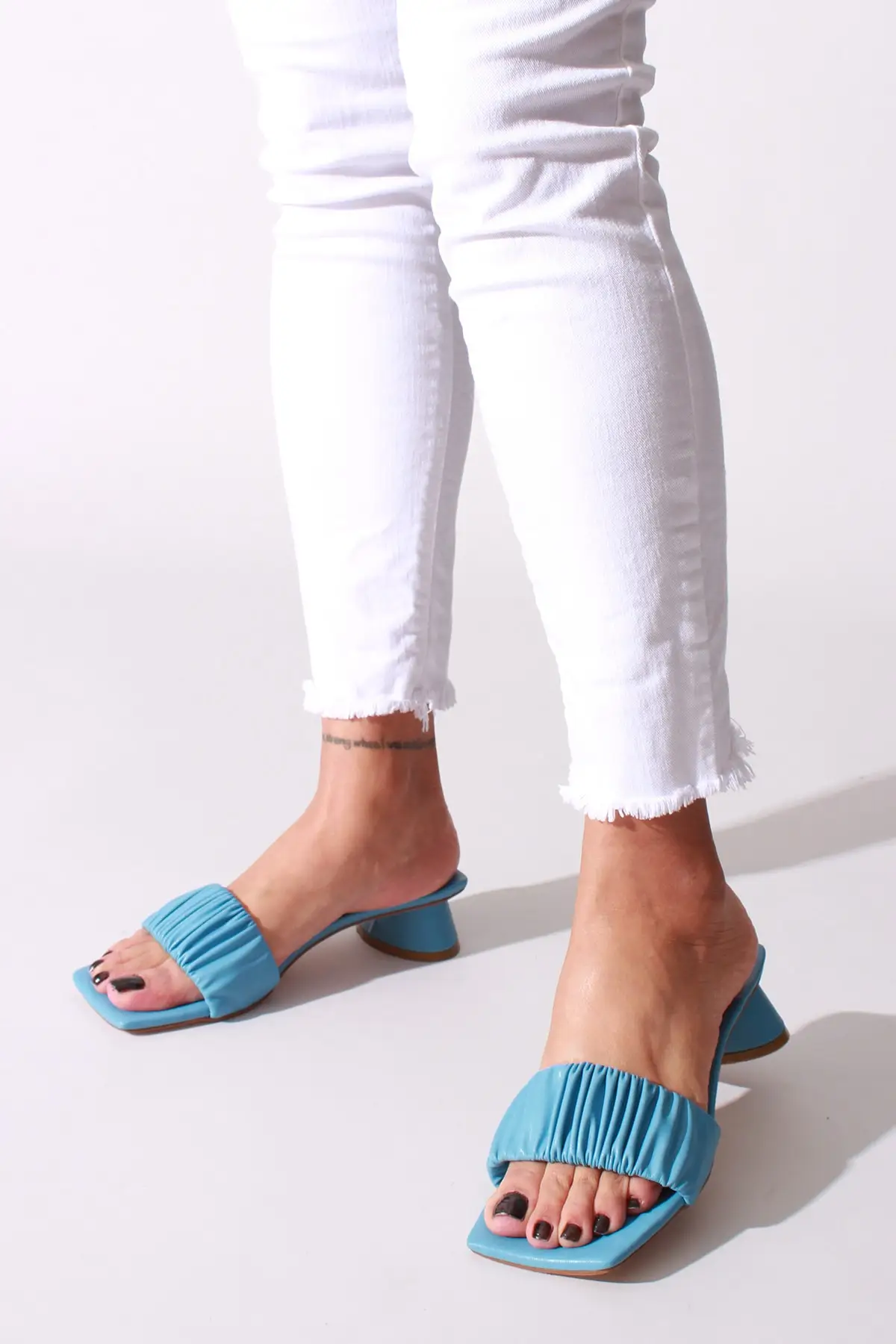 

Women blue skin slippers
