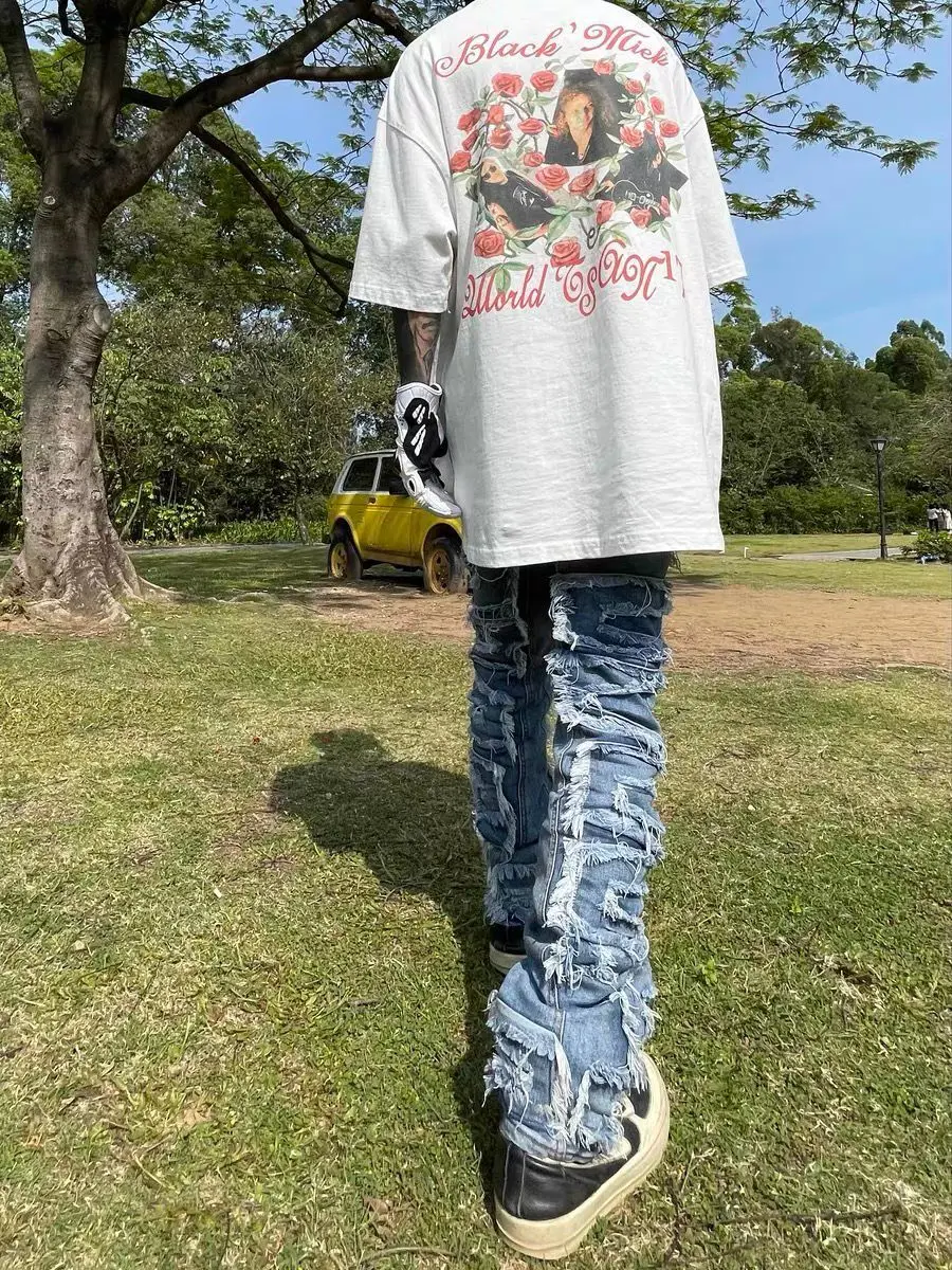 European and American high street washed cat mustache damaged patch jeans made old beggars show thin leg pants ins tide