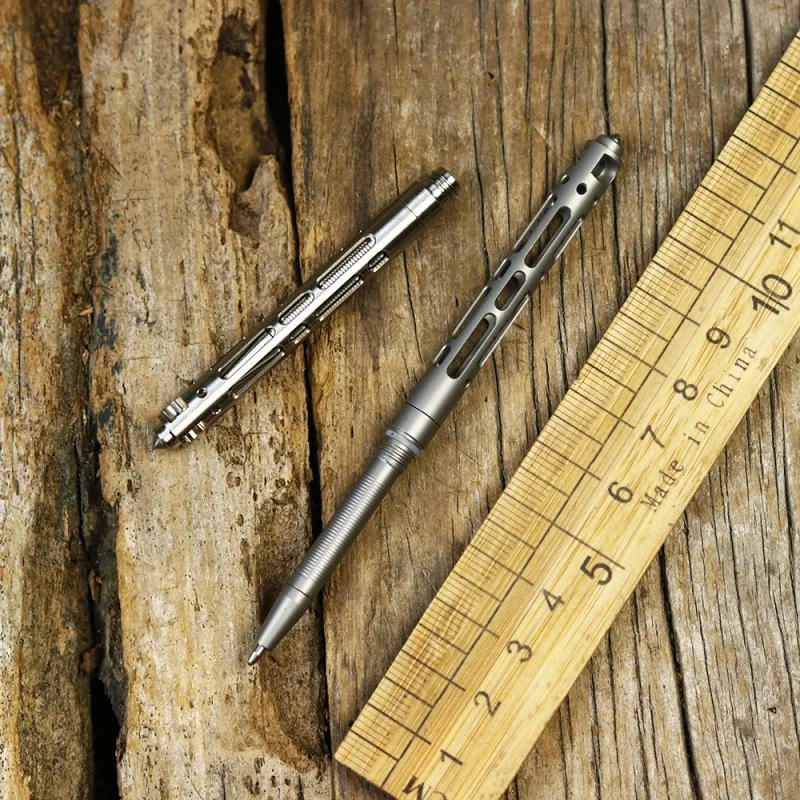 

Тактическая ручка из титанового сплава, многофункциональный уличный мини-молоток, разрыв стекла, защита от волка, Самооборона, искусственн...