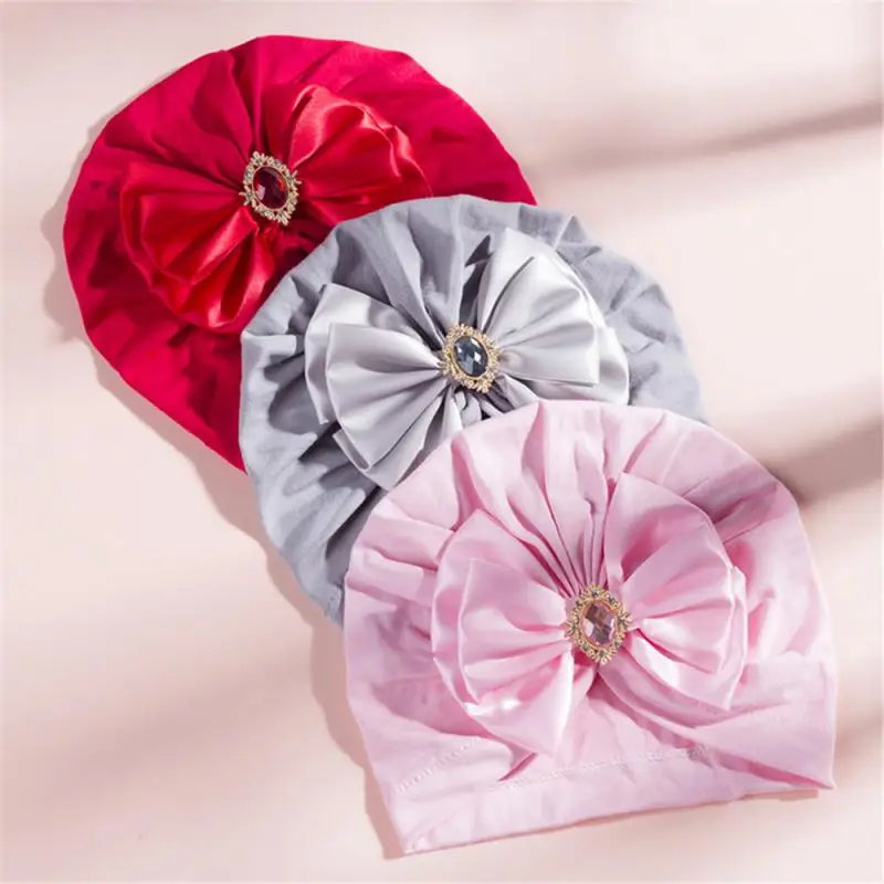 

Baby Hat Kids Solid Color Big Bowknot Rhinestone Beanies Hat Soft Cotton Baby Girl Hat For Newborn Baby Clothing Accessories