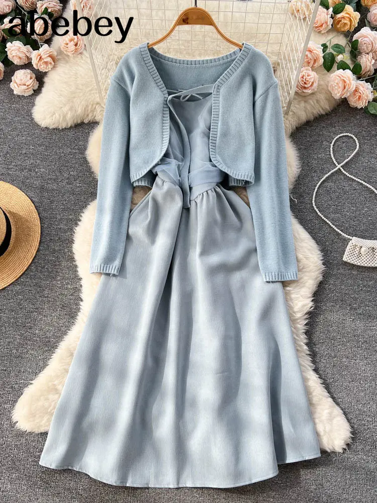 

2022 Solid Long Sleeve Knitted Sweater Cardigan and Spaghetti Strap Bodycon Midi Dress Suits Women Two Pieces Sets
