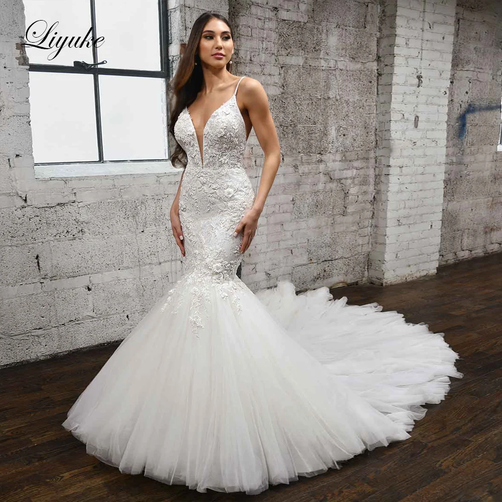 

Liyuke Beading Appliques Lace Mermaid Wedding Dress Sexy Spaghetti Straps Backless Deep V-Neck Trumpet Bridal Gowns