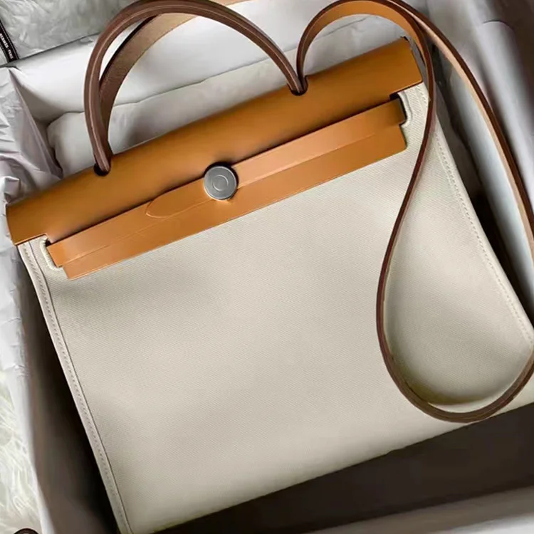 

Качественный роскошный бренд 2023 Новинка холщовая женская сумка Келли в академическом стиле ручная сумка из натуральной кожи на одно плечо ...