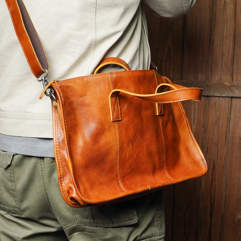 

Tanned slung hand-held briefcase