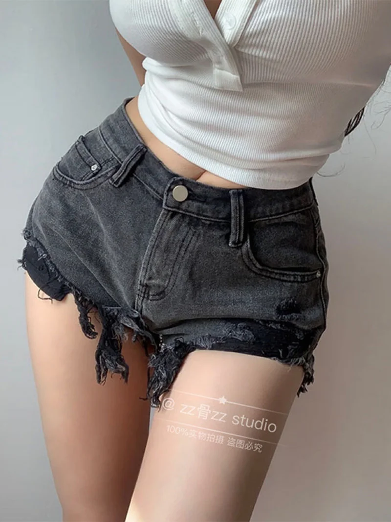 

Летние новые женские уличные модные повседневные Элегантные джинсовые шорты с низкой талией шорты с дырками и кисточками пикантные корейские женские M8JP