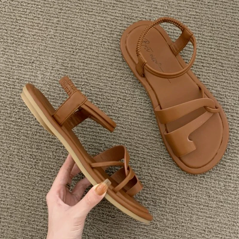 

French Flat Bottom Niche Design High-end Women Low-heeled Shoes 2022 New Summer Soft Bottom Clip-on Beach Roman Sandals Women