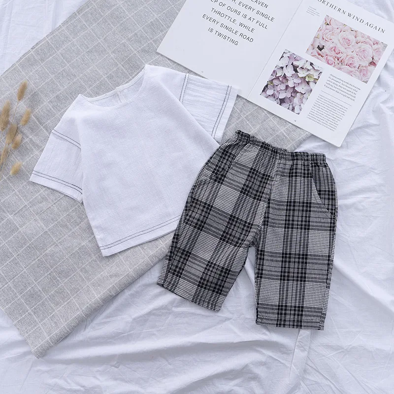 

Летняя красивая одежда для маленьких мальчиков и девочек, детская хлопковая Повседневная Однотонная футболка с круглым вырезом и коротким ...