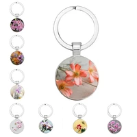 xinxing daisy rose sakura simple style keychain 1 glass round jewelry lily pendant keychain gift for men and women