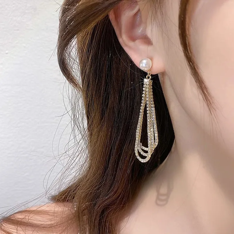 

Silver Needle Long Rhinestone Chain Tassel Pearl Earrings Premium Sense Personality Fashion Style Earrings.