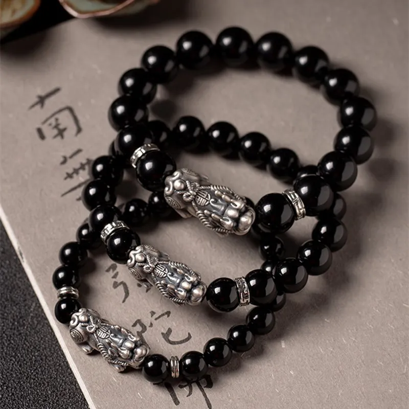 

Natural obsidian PI xiu bracelet men hand string Buddha bead atmosphere versatile boyfriend gift Best wishes wholesale bangle