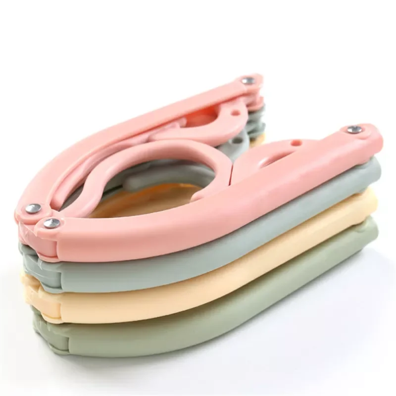 

2022New 5pcs Retractable Portable Travel Hanger Multifunctional Plastic Rack Drying Rack Pin Trousers Hanging Tool Storage Rack