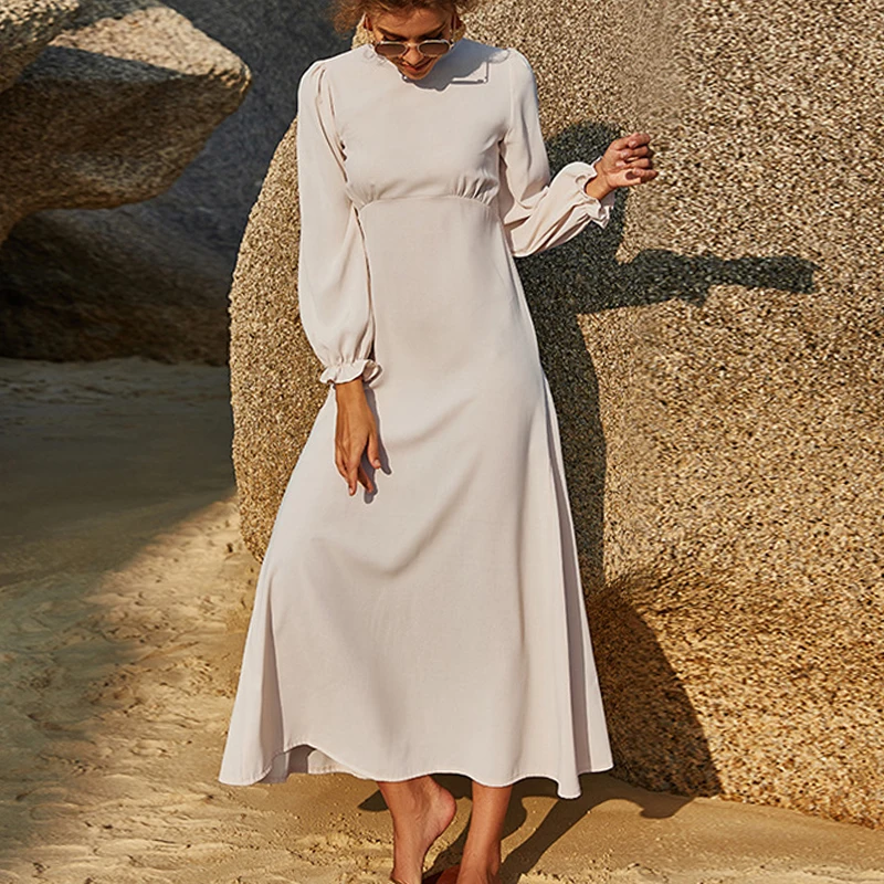 

Женское свободное платье-макси с круглым вырезом и длинным рукавом