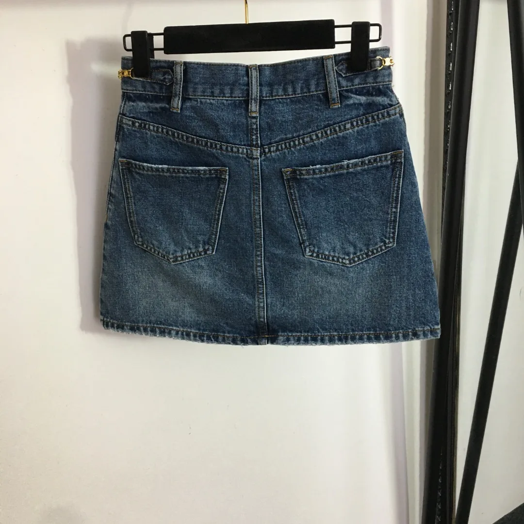 

Retro denim skirt women's spring and summer high waist a-line bag buttocks show legs long mouth anti-light short skirt tide