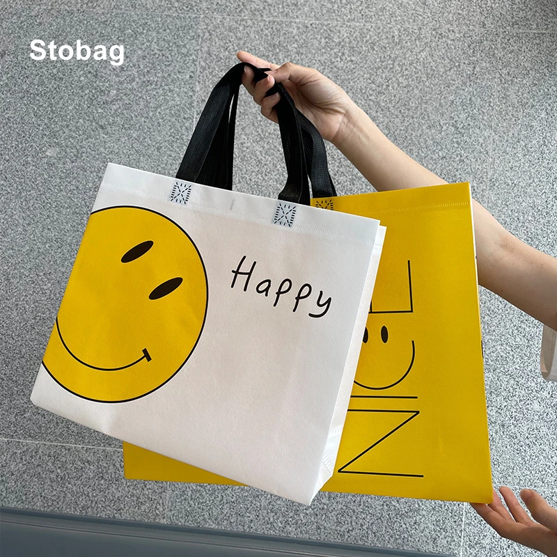 

StoBag, 10 шт., Нетканая желтая сумка-тоут для покупок с улыбкой, тканевая Экологически чистая большая многоразовая сумка для хранения подарков ...