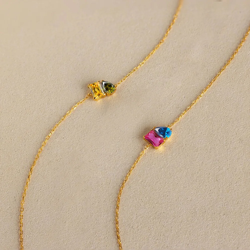 Фото Браслет St-Delan 12 Birthstone — формы капли и квадрата, из нержавеющей стали с 14-каратным золотым покрытием и цирконием №5