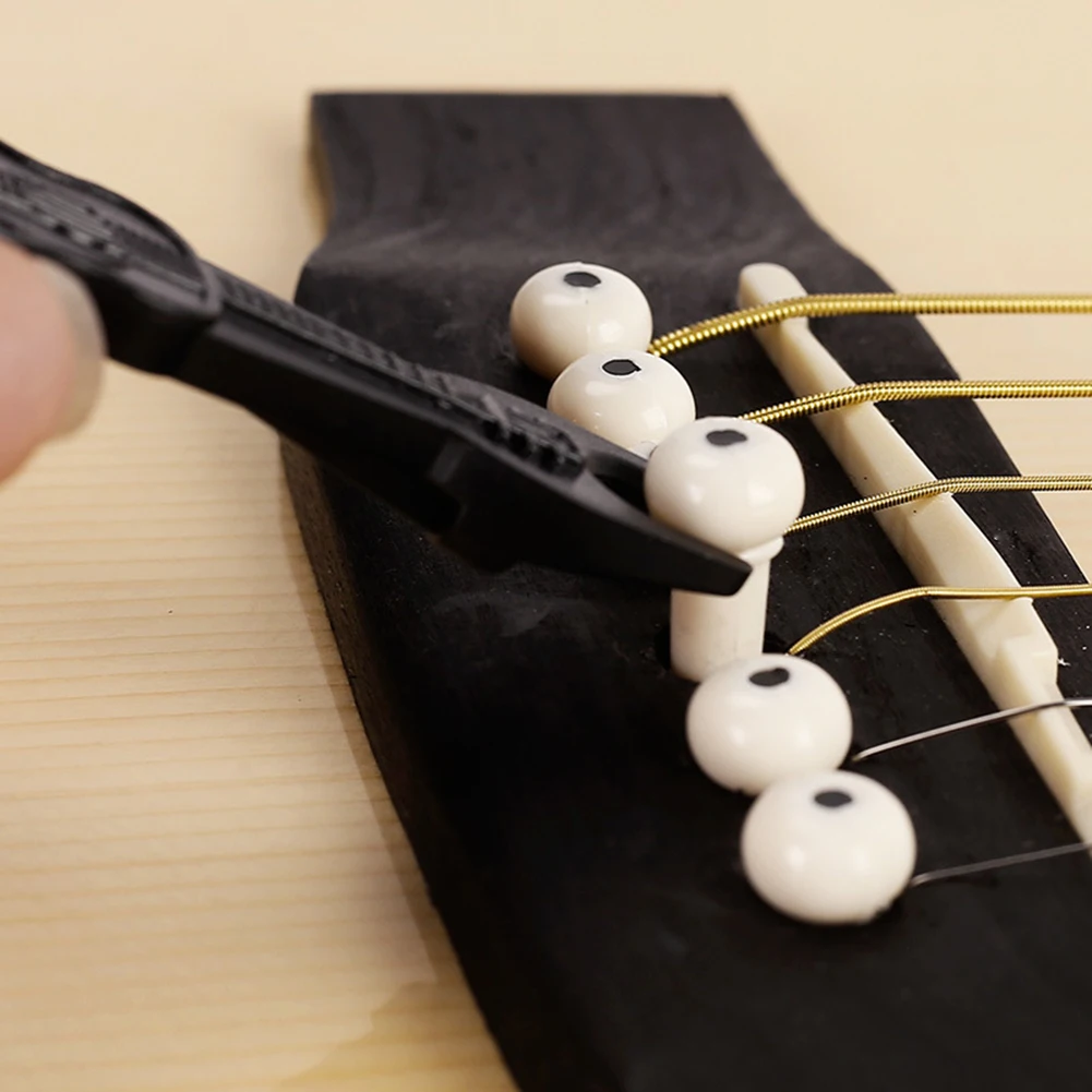 

26pcs Guitar Bridge Pins Pegs Puller Nail Pulling Remover Extractor Guitar Set