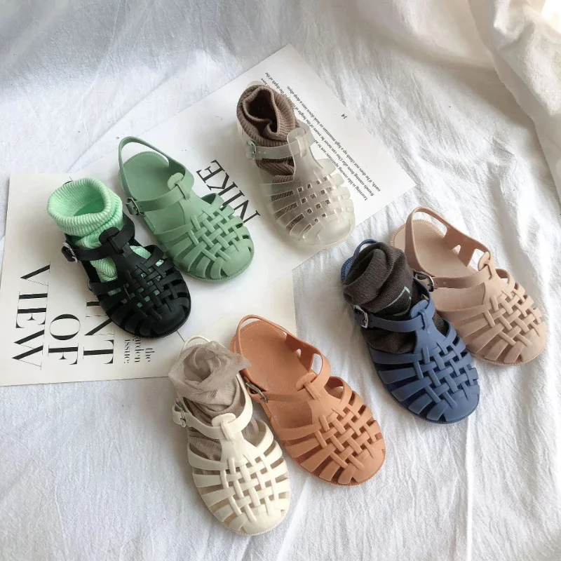 

Сандалии детские мягкие Нескользящие, пляжная обувь для маленьких принцесс, карамельные цвета, повседневные римские сандалии для мальчиков и девочек, летняя обувь