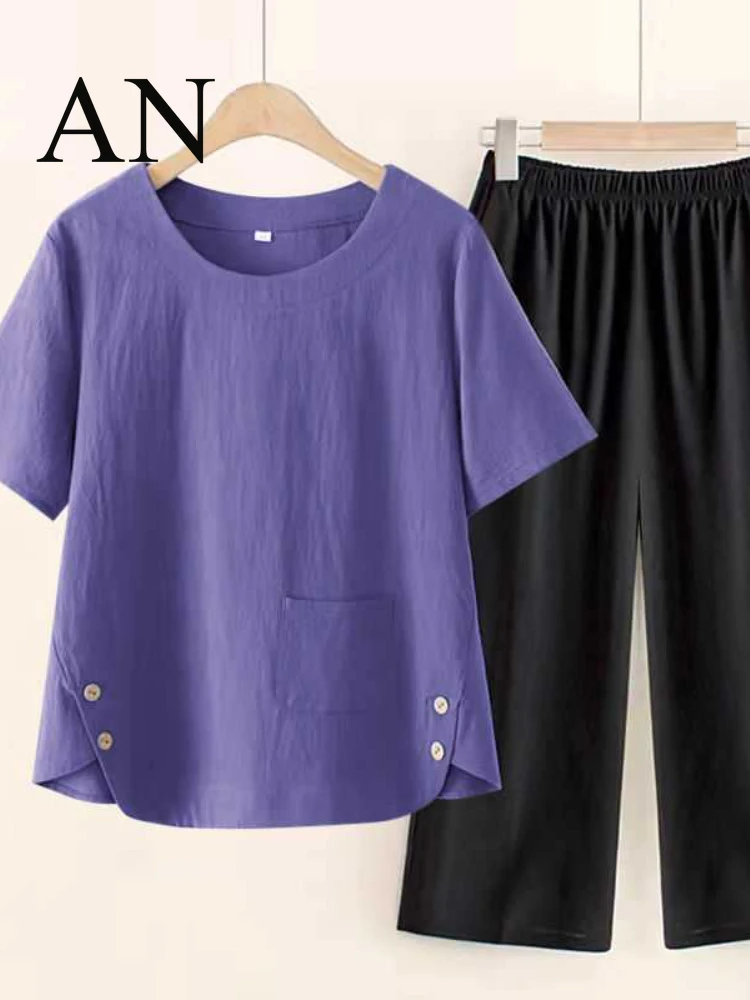 

Casual Cotton and Linen Suit Women's Summer New Loose Temperament Short Sleeve Seven-point Wide Leg Pants Two-piece Set