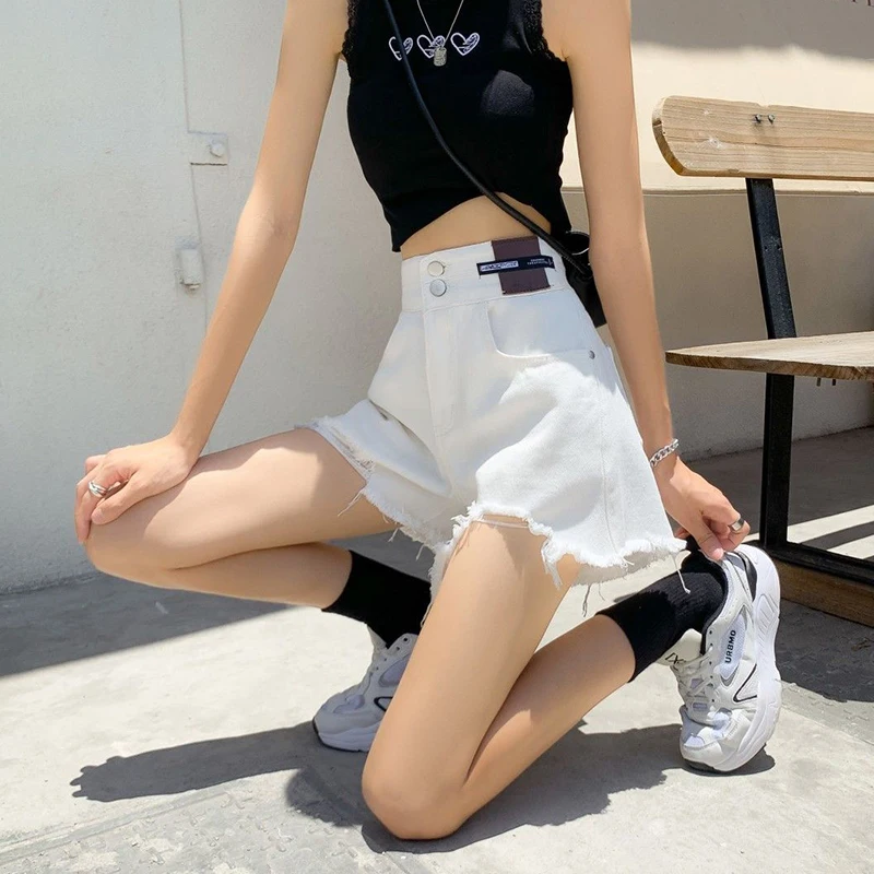 Женские рваные джинсы с высокой талией