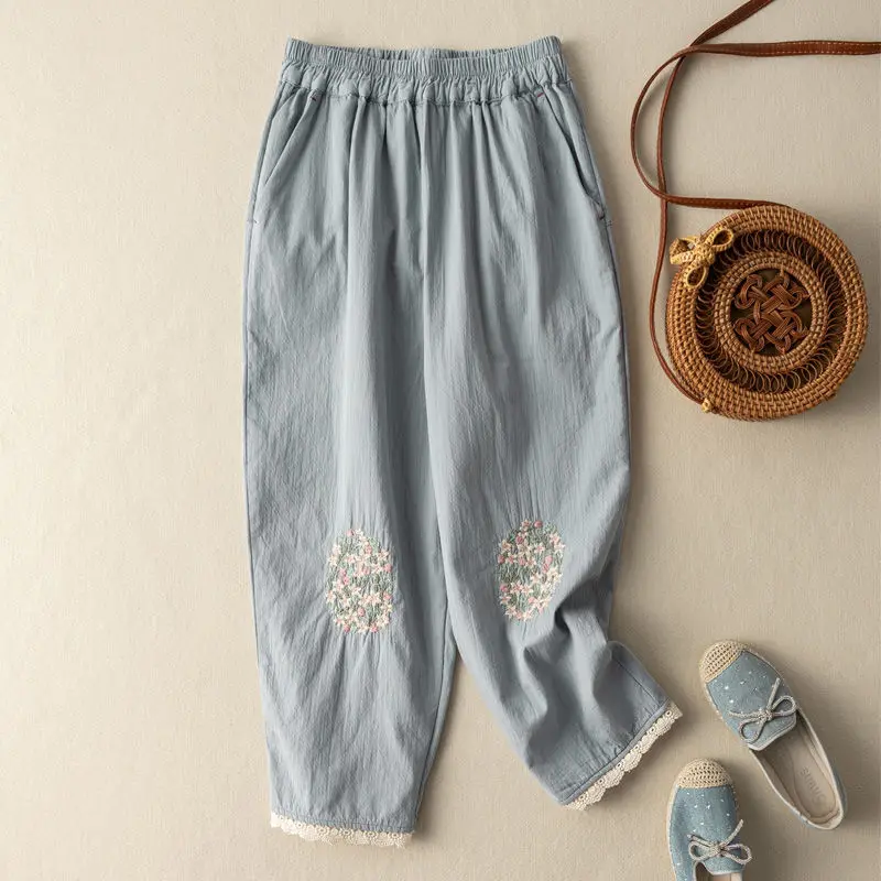 

Cotton and linen embroidered casual pants women's summer new fashion literary retro loose lace lace nine-point harem pants