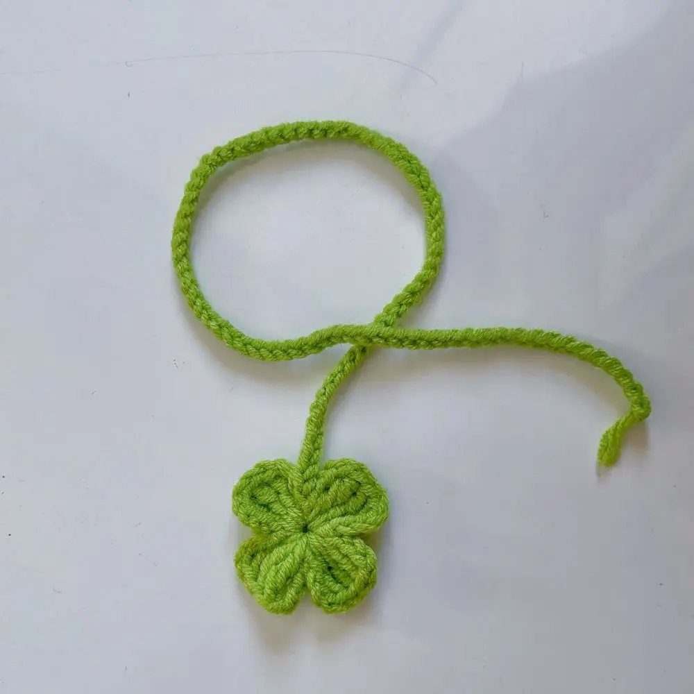 

Вязаная закладка "Подсолнух"