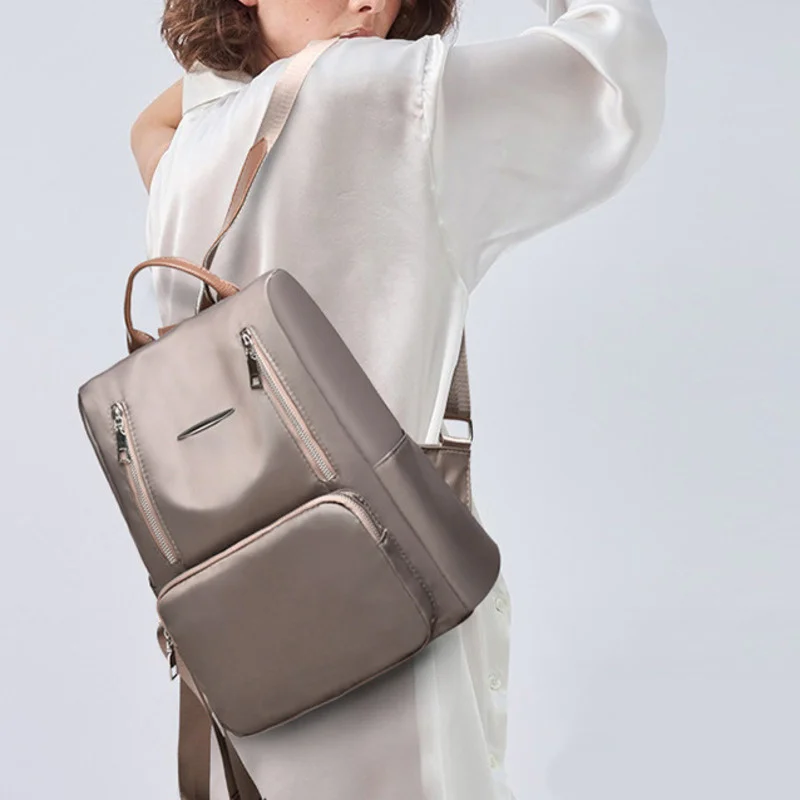 

Новый женский рюкзак с защитой от кражи, дизайнерский высококачественный тканевый женский простой дорожный рюкзак, модный рюкзак в студенч...