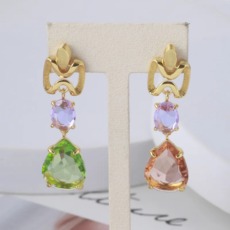

European and American transparent color water drop type asymmetric Earrings