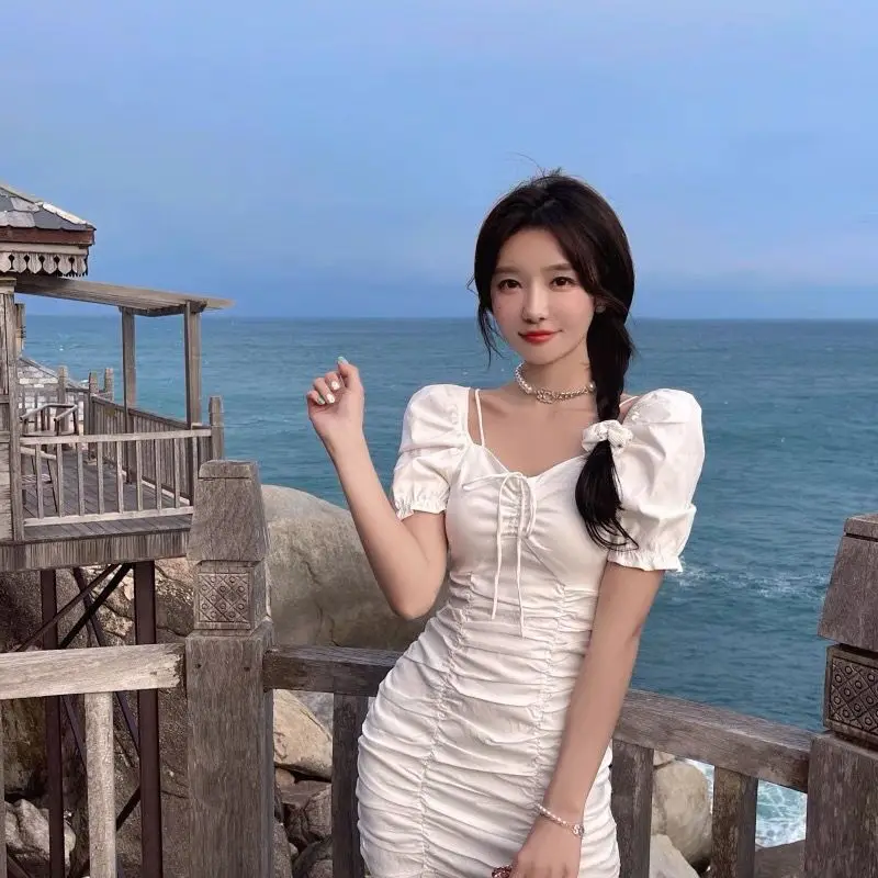 

Summer 2022 New Korean Style Bubble Sleeve Pleated Drawcord Slim Dress Women White Bandage Bodycon Club Beach Mini Dress