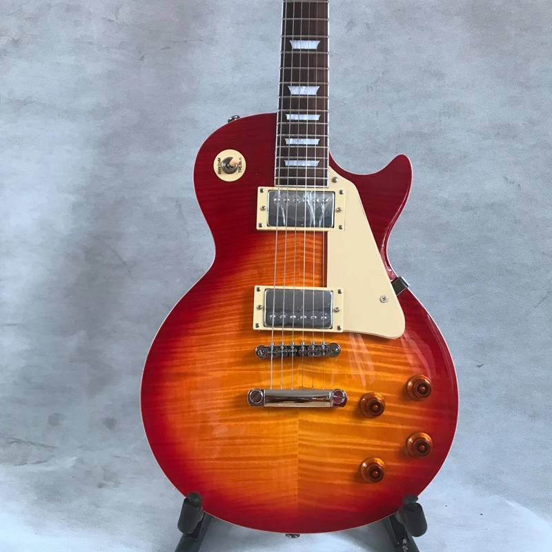 

High quality electric guitar, red sunflower gradient color, imported paint, mahogany body, rosewood fingerboard, quick package