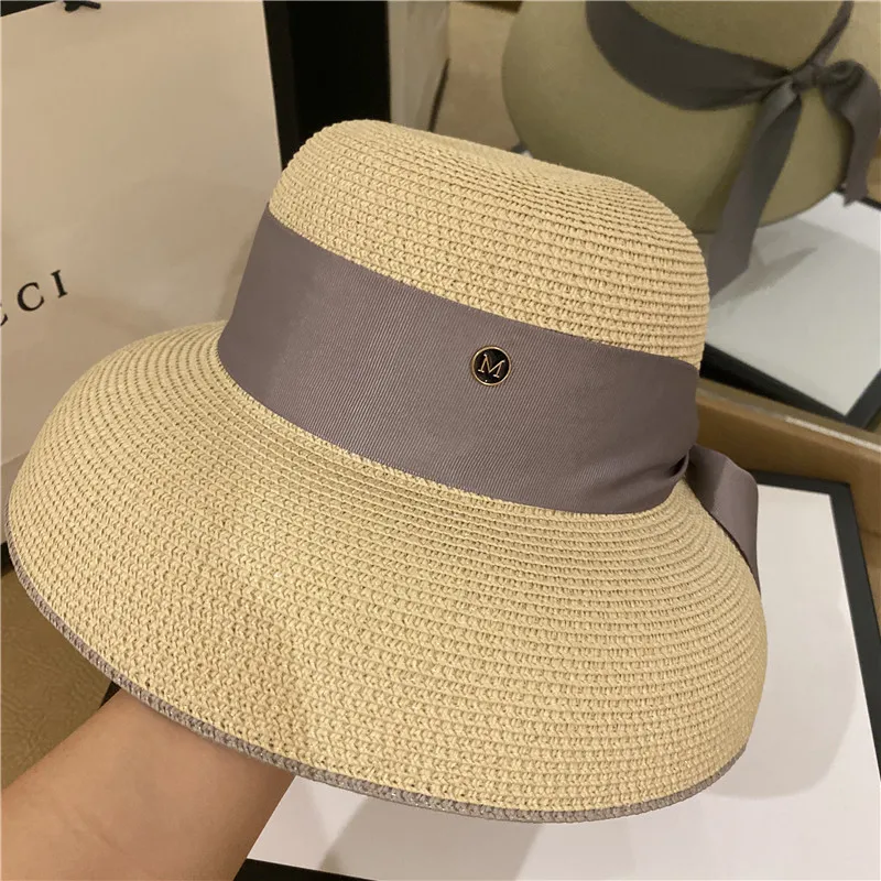 

Chun xia female straw hat Hepburn windy eaves temperament straw hat sunscreen topi M label ribbon bow beach hathigh quality hat