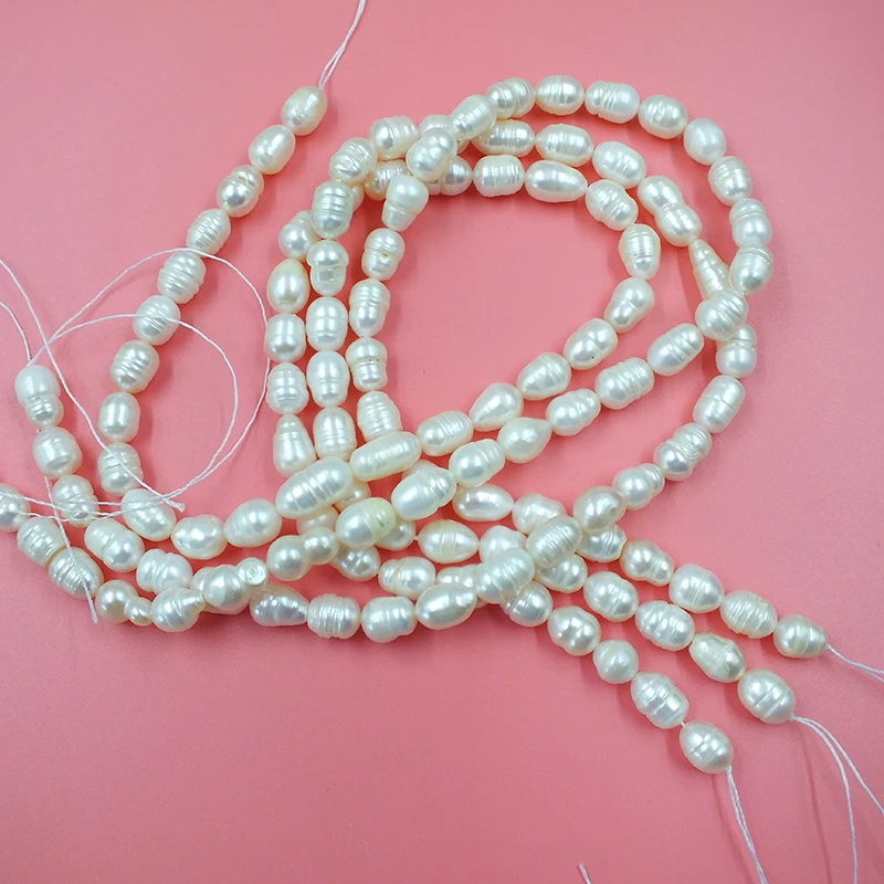

3 strands 7-8MM natural cultured rice shaped freshwater pearl loose beads. DIY enthusiasts handmade beading 15”