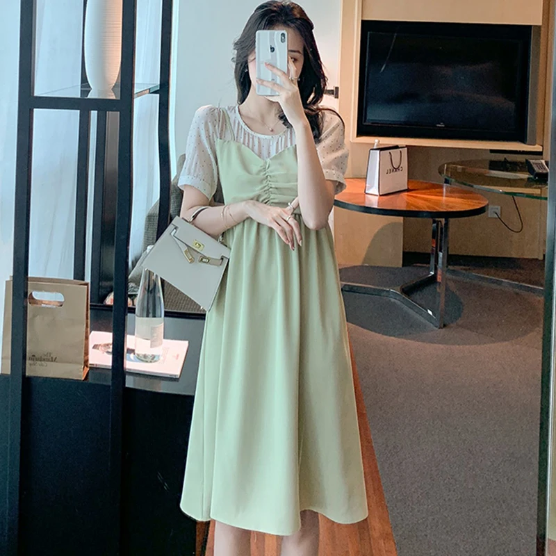 Женское винтажное платье миди черное составного кроя с имитацией двух частей в