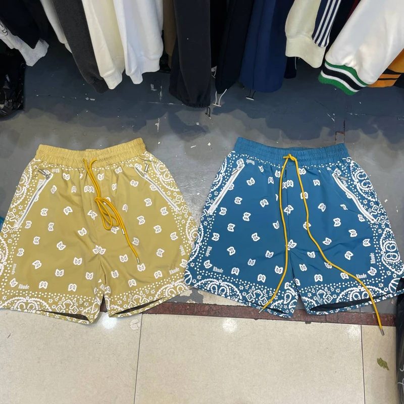 

23ss Rhude Shorts Cashew Blossom Relaxed Breathable Mesh Sports Drawstring Shorts for Men Women
