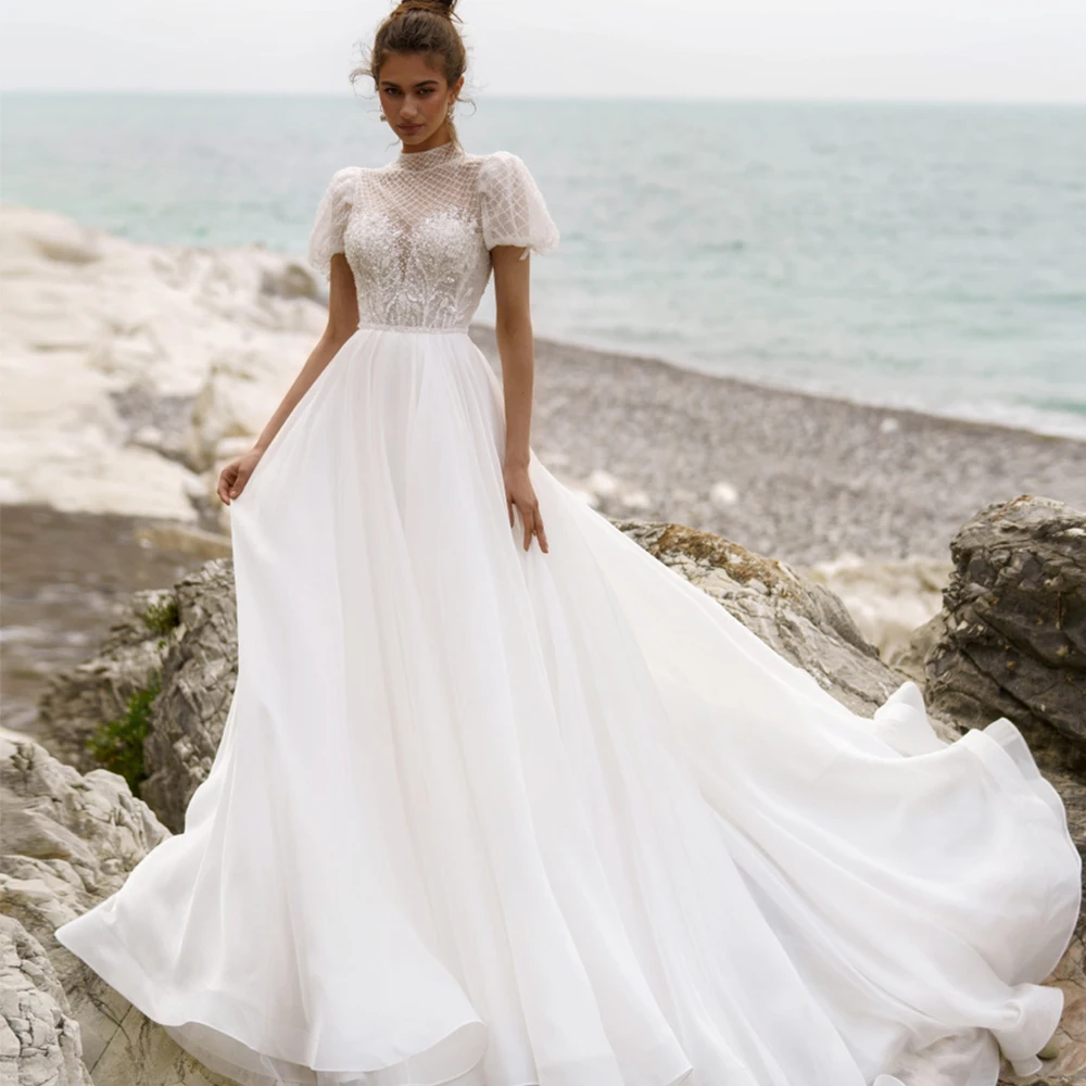 

Boho Bridal Gowns 2022 Короткие пышные рукава Высокий воротник Аппликации Свадебные платья Illusion Pearls Длина до пола Свадебное платье