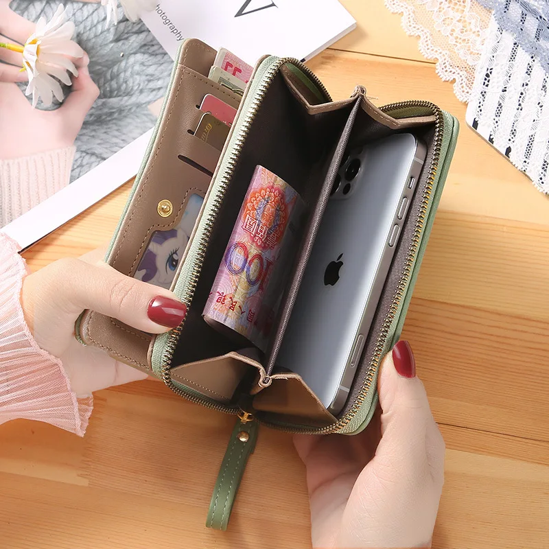 New solid color ladies wrist strap clutch bag fashion Korean version of the long women's zipper wallet large wallet wholesale.