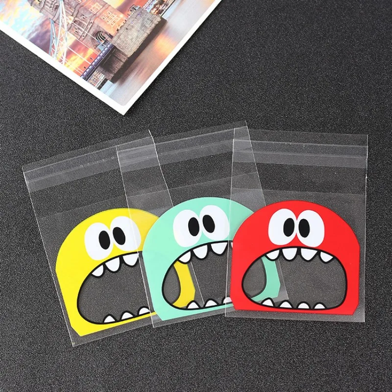 

100PCS Cute Cartoon Cellophane Biscuit Bags Gift Plastic Cookie Bags Wedding Candy Packing Bag OPP Bags with Self Adhesive 7x7