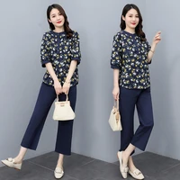 casual cotton and linen suit female summer new loose large size fashion short sleeved floral top nine point pants two piece set