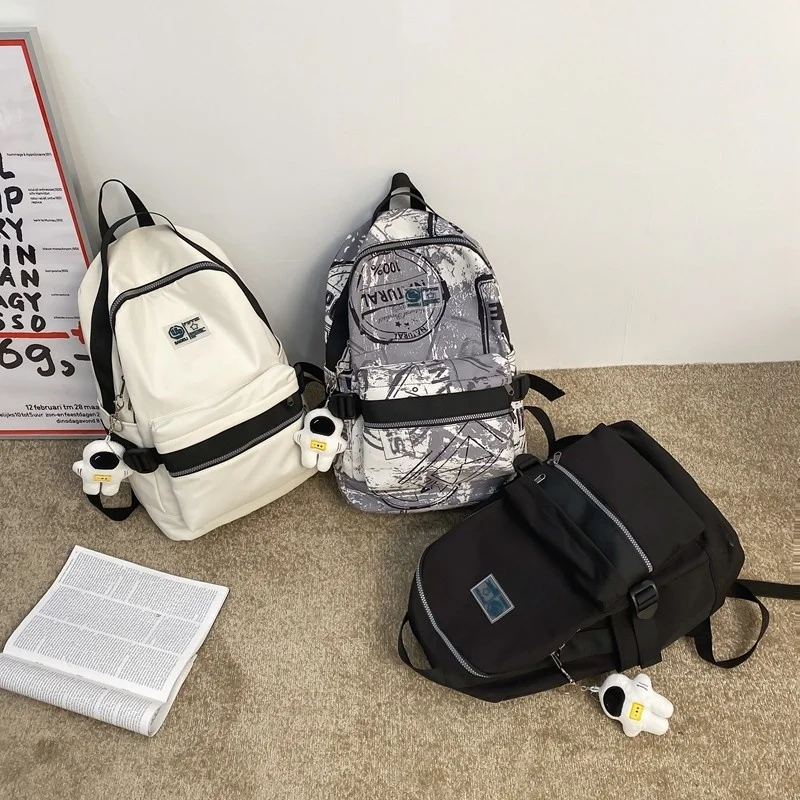 

Astronaut Pendant Women Backpack Large Capacity School Bag For Girls Nylon Waterproof Anti-theft Traveling Backpacks Knapsack