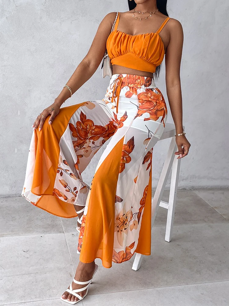 Топ на бретельках с рюшами и широкие брюки цветочным принтом