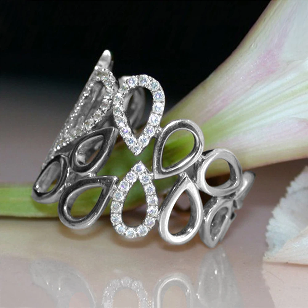 

Huitan New Fashion Hollow Out Water Drop Linked Women Finger Ring Silver Color CZ Stylish Versatile Female Party Daily Wear Ring