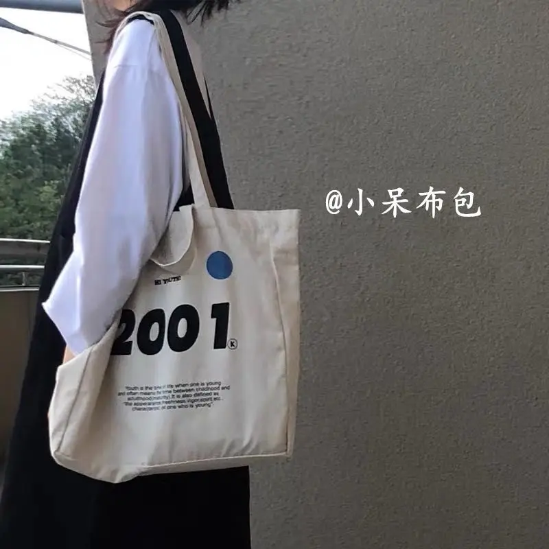 

Bag 2022 new ins canvas women's Single Shoulder Messenger portable Korean student literature and art simple cloth bag Harajuku