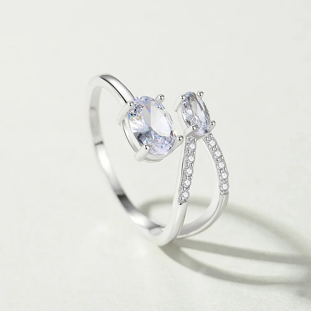 Кольцо женское из серебра 925 пробы с синим геометрическим крестом