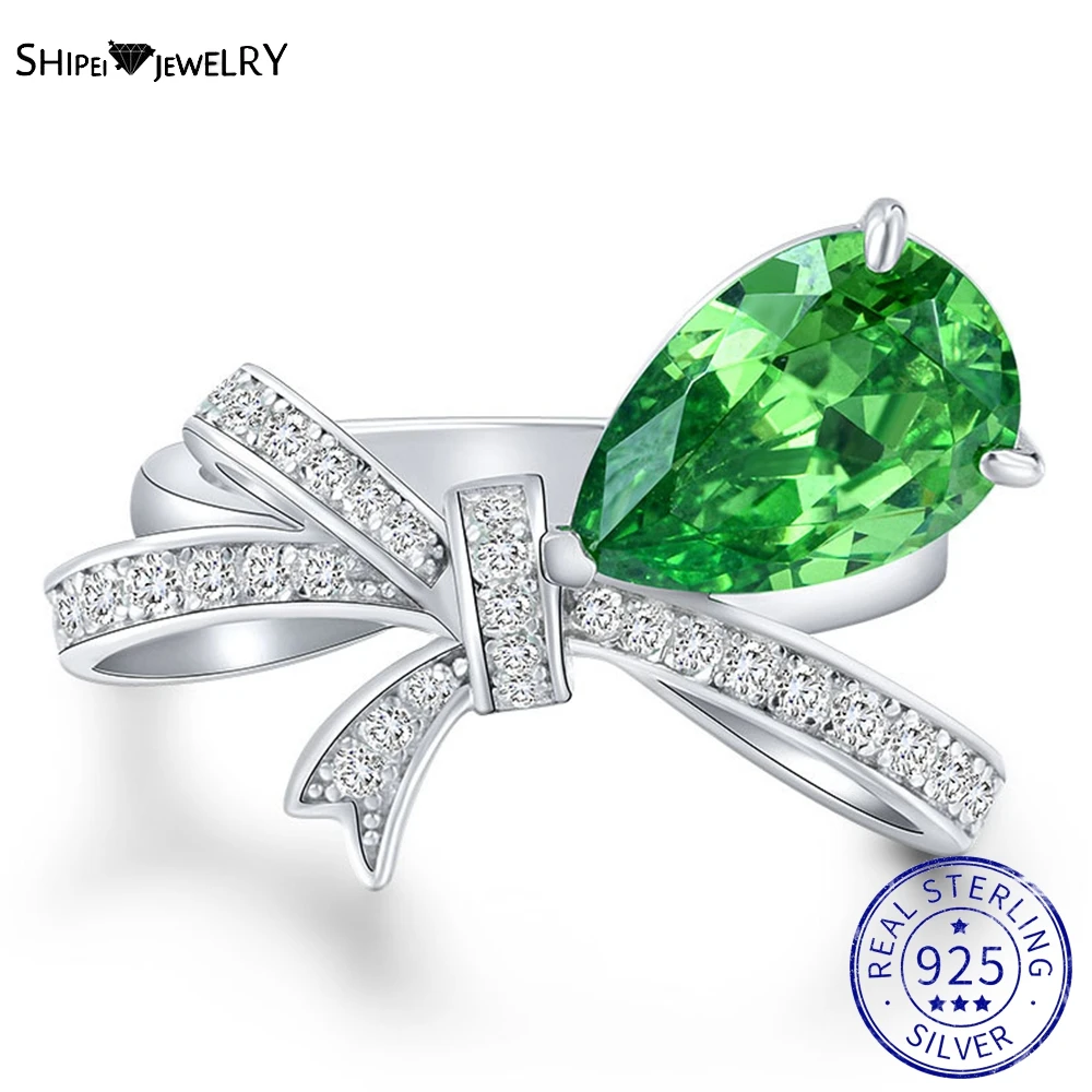 

Shipei 925 Sterling Silver Pear Cut Created Moissanite Emerald Gemstone Wedding Fine Jewelry Engagement Bowknot Ring For Women