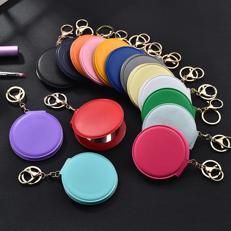 

Korean Fashion Cosmetic Mirror Pu Small Round Mirror Key Chain Double-sided Folding Mirror Hair Ball Car Key Mirror Pendant