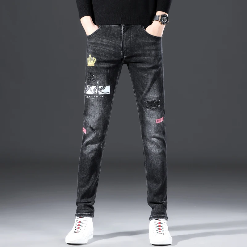 

2022 autumn and winter new luxury watermark graffiti black jeans with holes in high-end small feet casual pants