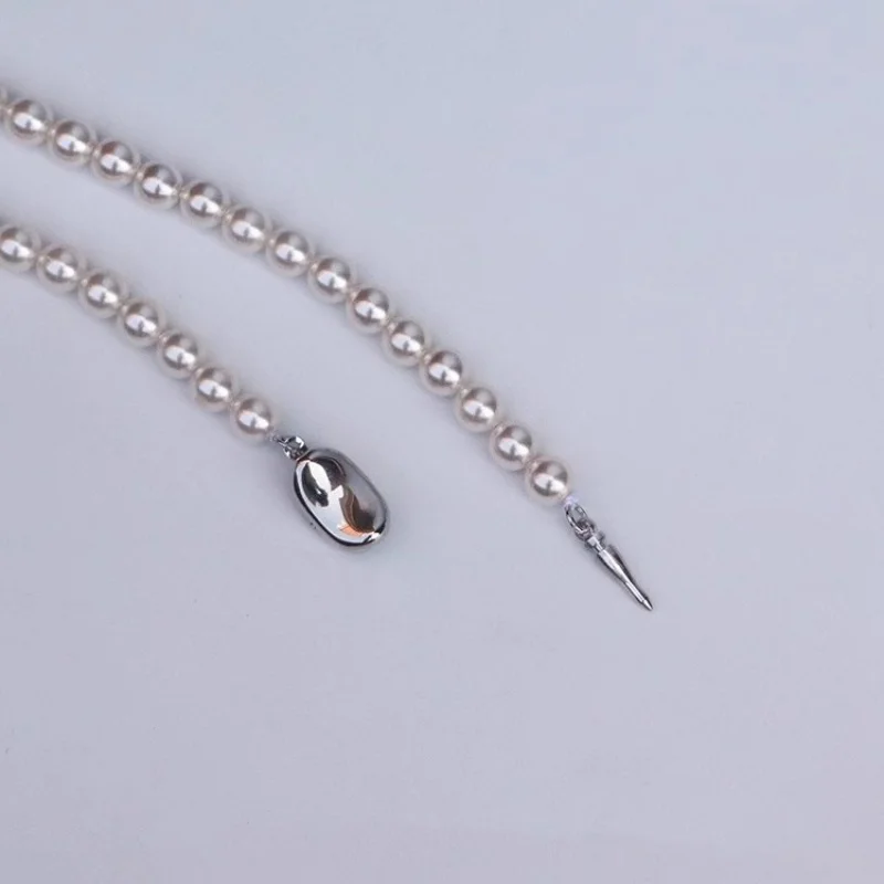 s925Серебряный круг Shijia Pearl Yuanbao Knot60cmОдлиненное ожерелье Женское модное